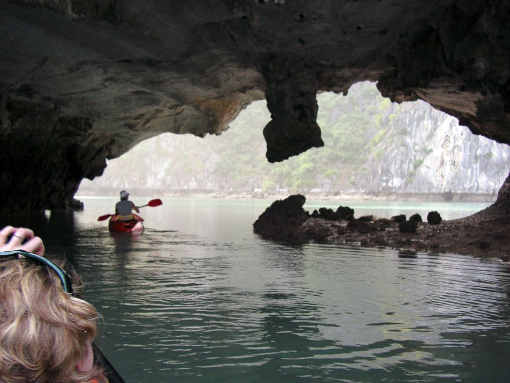Kayaking through a cave in Lan Ha Bay, Cat Ba National Park